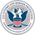 Circular seal for U.S. Customs and Border Protection: spread-wing eagle clutching a striped shield beneath a globe and compass, encircled by a blue band reading the agency name and Homeland Security.